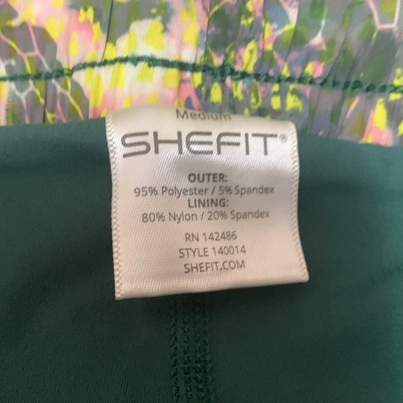 SheFit 2 in 1 Running Shorts Green Conquer and Print Size M NWT - Picture 12 of 12